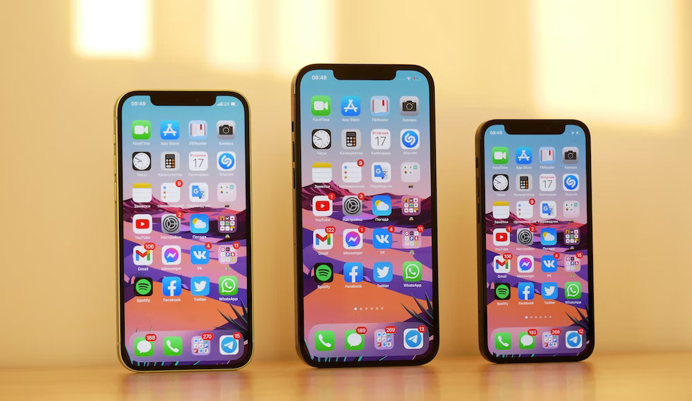 One Phone Mirrored On Two Other Phones